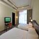 غرفة بسريرين  فندق أجنحة الراية سويتس - المنامة | هوتيلز عربي