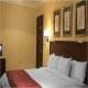 غرفة مزدوجة  فندق ميديترينيان سويتس - الاسكندرية | هوتيلز عربي