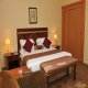 غرفة  فندق كاسليز للشقق الفندقية - ابوظبي | هوتيلز عربي