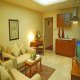 غرفة معيشة4 فندق أميري سويتس - عمان | هوتيلز عربي