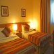 غرفة بسريرين فندق أميري سويتس - عمان | هوتيلز عربي