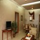 غرفة معيشة فندق أميري سويتس - عمان | هوتيلز عربي