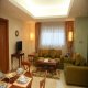 غرفة معيشة2 فندق أميري سويتس - عمان | هوتيلز عربي