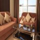 غرفة معيشة بالشقة فندق لاجونا - الكويت | هوتيلز عربي
