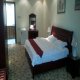 غرفة نوم بالشقة فندق المخملية - المدينة المنورة | هوتيلز عربي