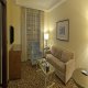 منطقة جلوس بالغرفة فندق أجنحة هيلتون - مكة المكرمة | هوتيلز عربي